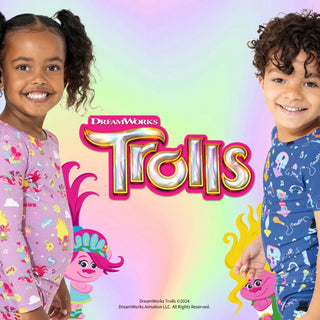 boy and girl wearing trolls themese bamboo pajamas