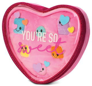 Heart-shaped pink pouch with cartoon characters and 'You're so sweet' text on a white background