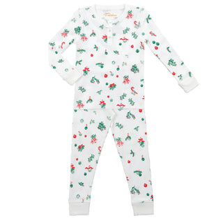 Children's pajama set with holly, bells, candy canes and ornaments pattern on a white background