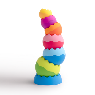 Colorful toy resembling an ice cream cone on a white background