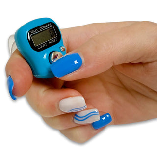 Blue digital finger counter on a person's finger with a white background