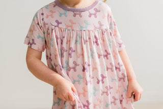 Short Sleeve Swing Dress in Shrinking Violet Balloon Dogs
