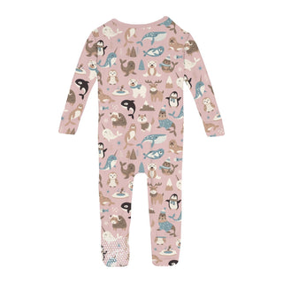 Children's pink coverall with animal pattern on a white background