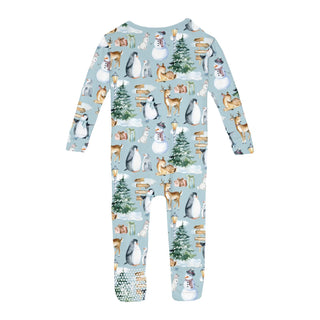 Children's onesie with winter-themed design on a light blue background