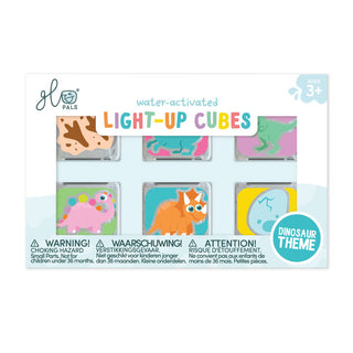 Packaging of water-activated light-up cubes with dinosaur theme on a white background