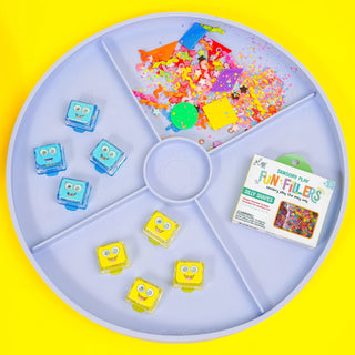 Colorful sensory play set with jelly shapes on a yellow background