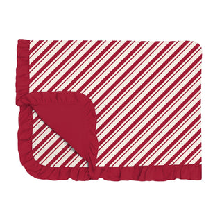Red and white striped blanket with ruffled edges on a white background