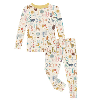 Children's pajama set with alphabet and animal pattern on a white background