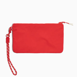 Red wristlet with a strap on a white background