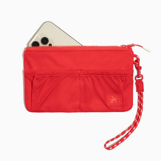 Red pouch with a phone inside on a white background