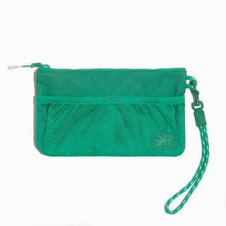 Green wristlet with multiple pockets on a white background