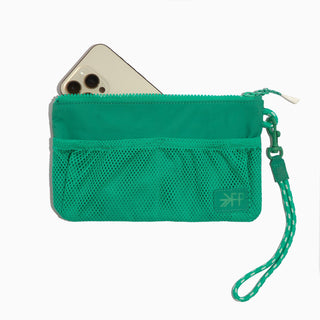 Green pouch with a phone inside on a white background