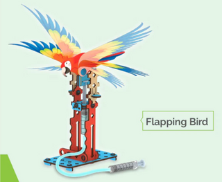 Mechanical model of a parrot with flapping wings on a white background