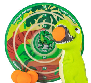 Toy dino with a Sticky Target and Squeeze Popper on a white background
