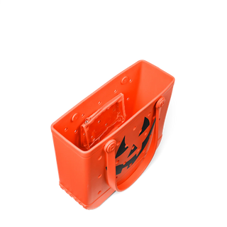 Orange pumpkin tote with a black jack o lantern design on a white background