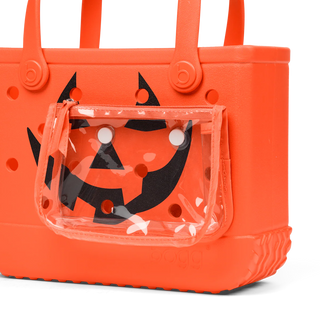 Orange jack o lantern tote with transparent pouch on a white background