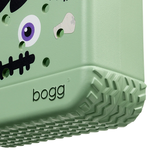 Green tote with a frankenstein face design and 'bogg' branding on a white background