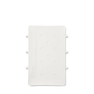 White plastic panel with multiple holes on a white background