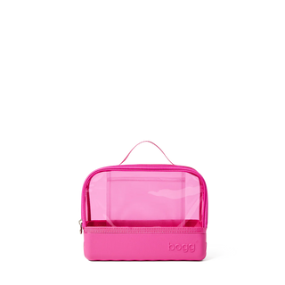 Pink toiletry bag with clear top on a white background