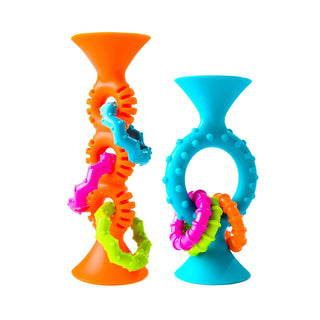 Two colorful silicone teething rings on a white background