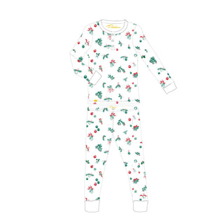 Children's pajama set with red and green holiday themed pattern on a white background